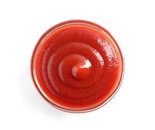 Delicious tomato sauce in bowl on white background, top view