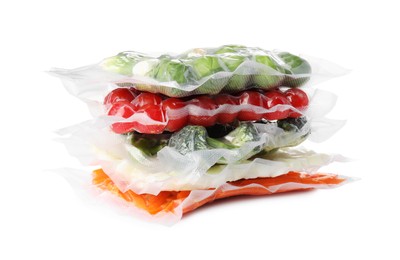 Photo of Stack of vacuum packs with different food products on white background