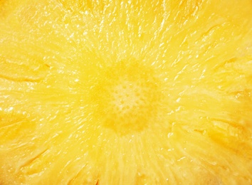 Slice of fresh juicy pineapple as background, closeup