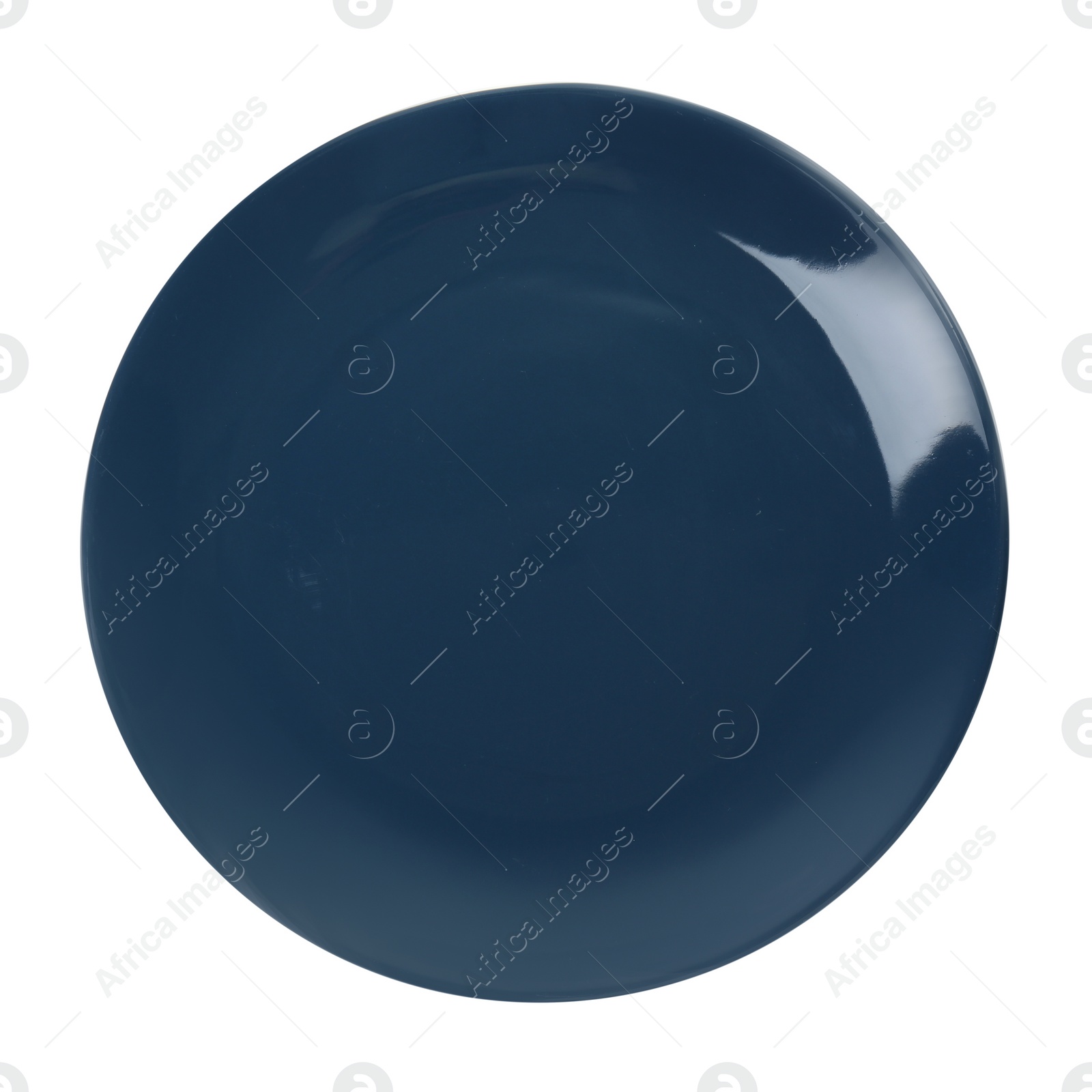 Photo of One dark blue ceramic plate isolated on white, top view