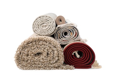 Rolled carpets on white background. Interior element