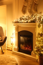 Fireplace in living room decorated for Christmas