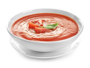 Dish with tomato cream soup on white background. Healthy food