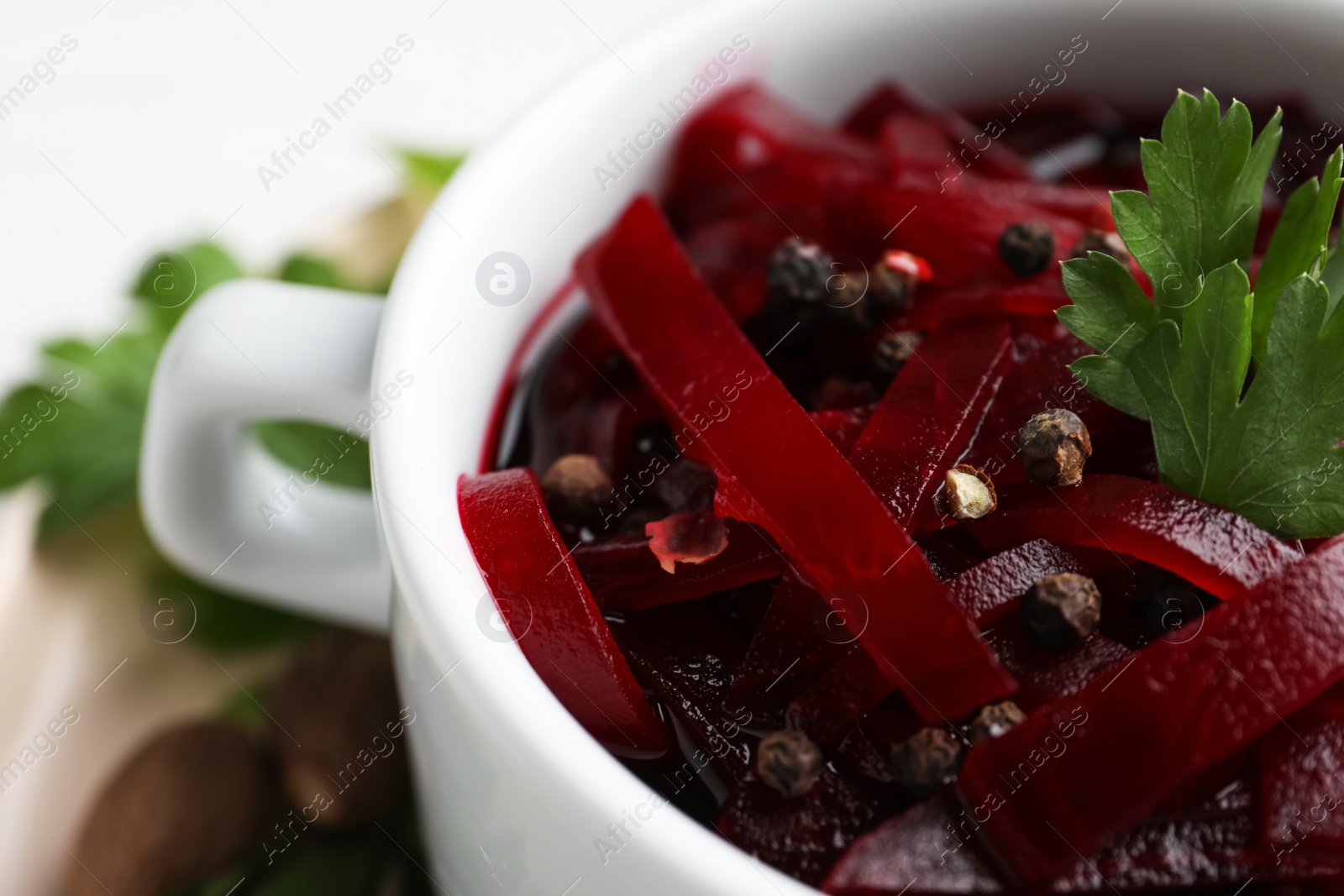 Photo of Delicious pickled beets in bowl, closeup view