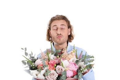 Young handsome man with beautiful flower bouquet on white background