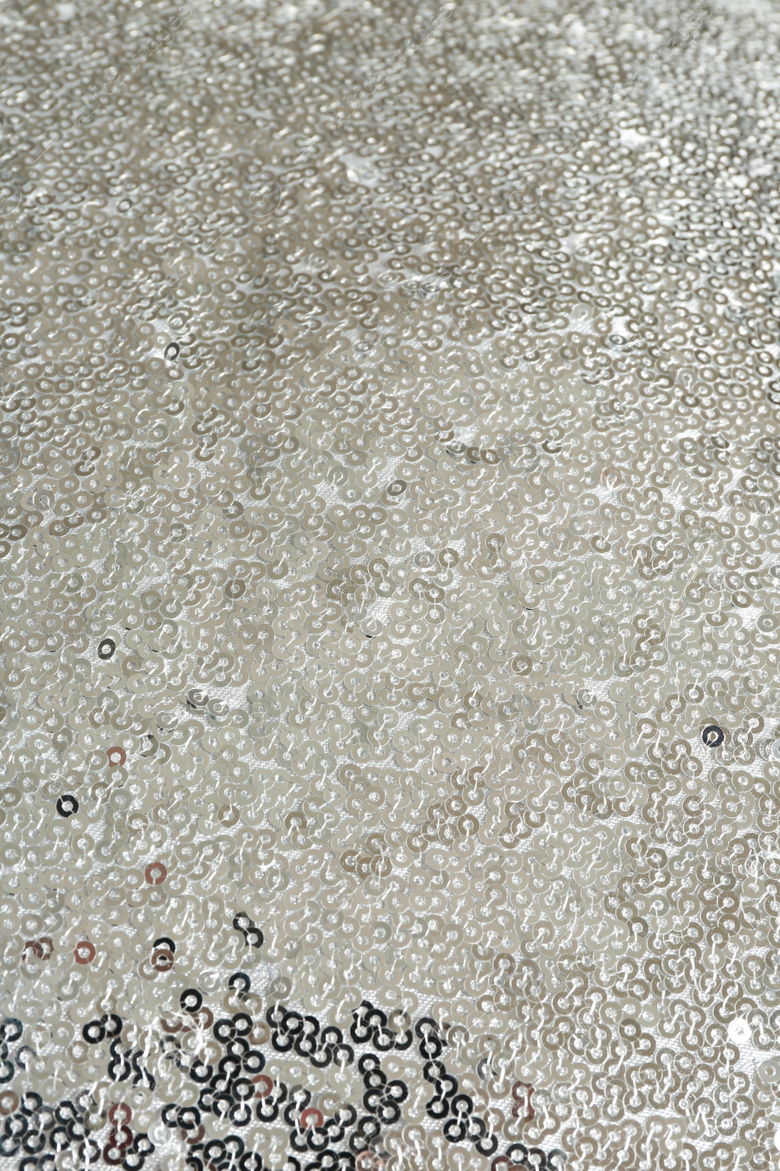 Photo of Fabric with beautiful shiny paillettes as background