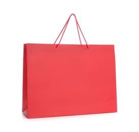 Photo of Red paper shopping bag isolated on white