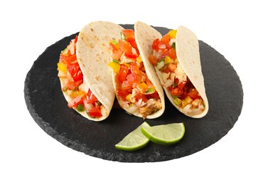 Delicious tacos with vegetables and slices of lime isolated on white