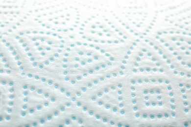 Toilet paper with pattern as background, closeup