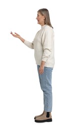 Full length portrait of senior woman on white background