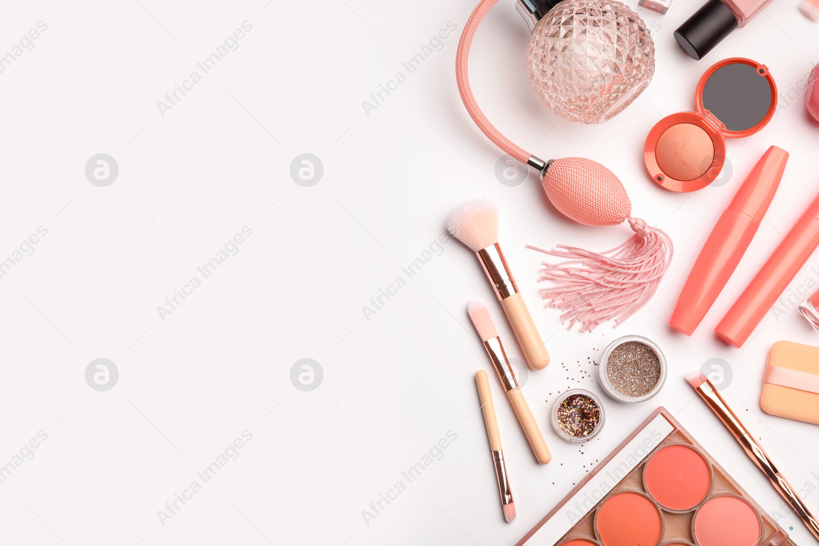 Photo of Flat lay composition with coral accessories on white background. Space for text