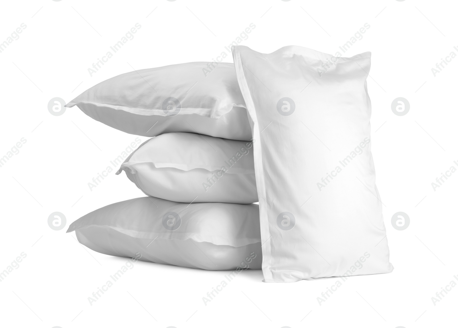 Photo of Many new soft pillows isolated on white