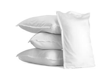 Photo of Many new soft pillows isolated on white