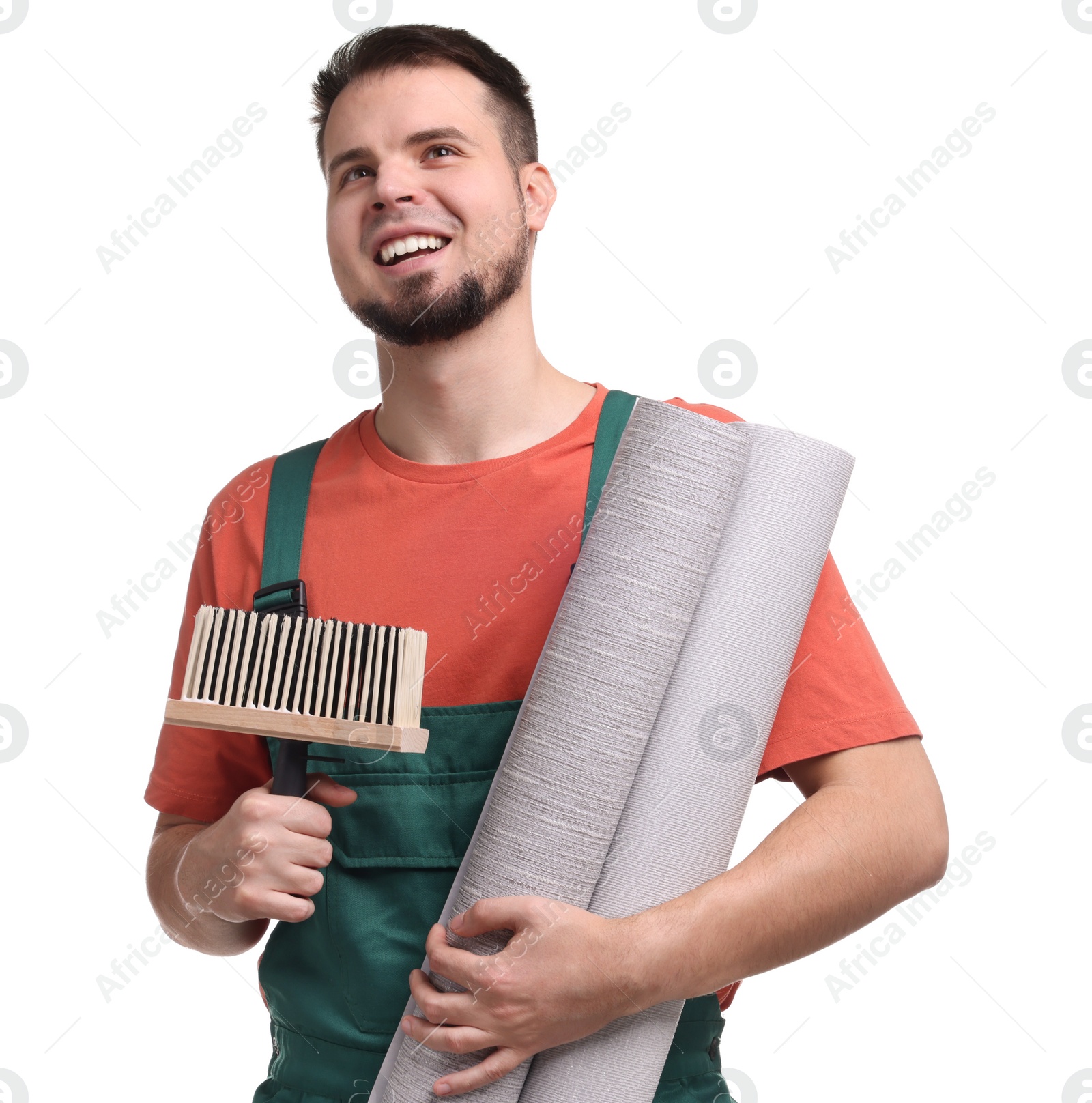 Photo of Man with wallpaper rolls and brush on white background