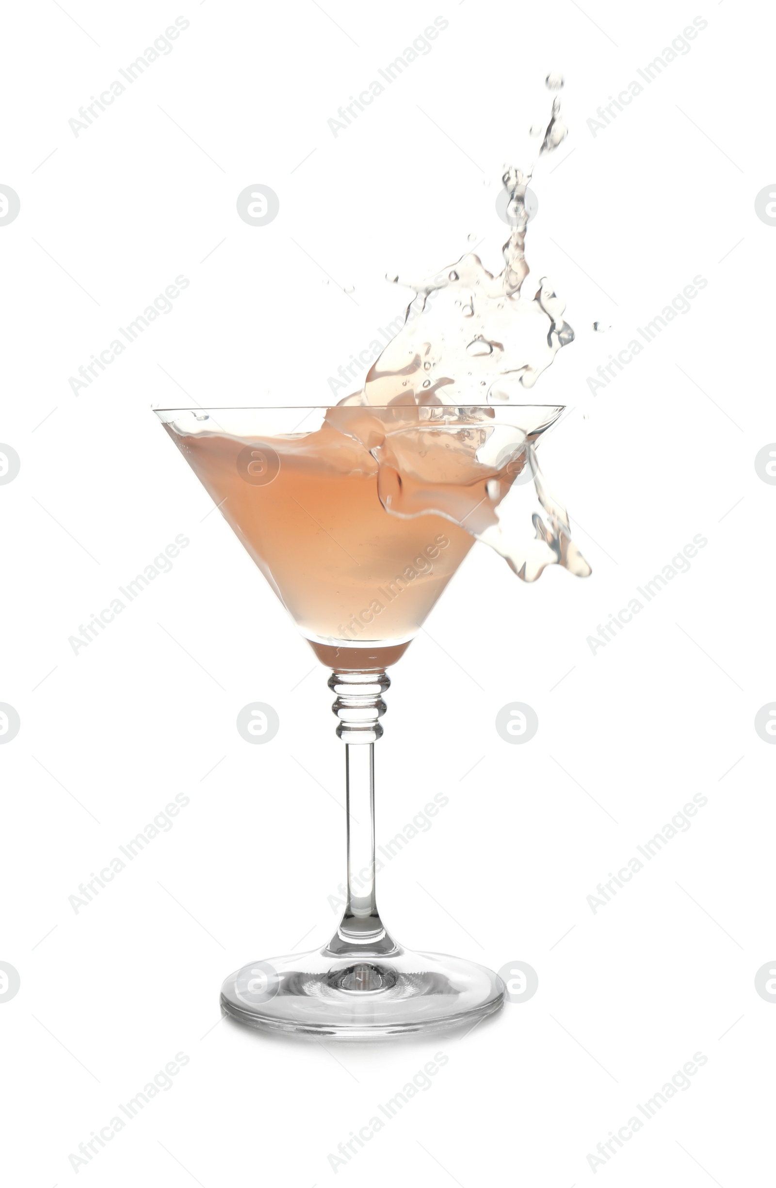 Photo of Glass of martini cocktail with splash on white background
