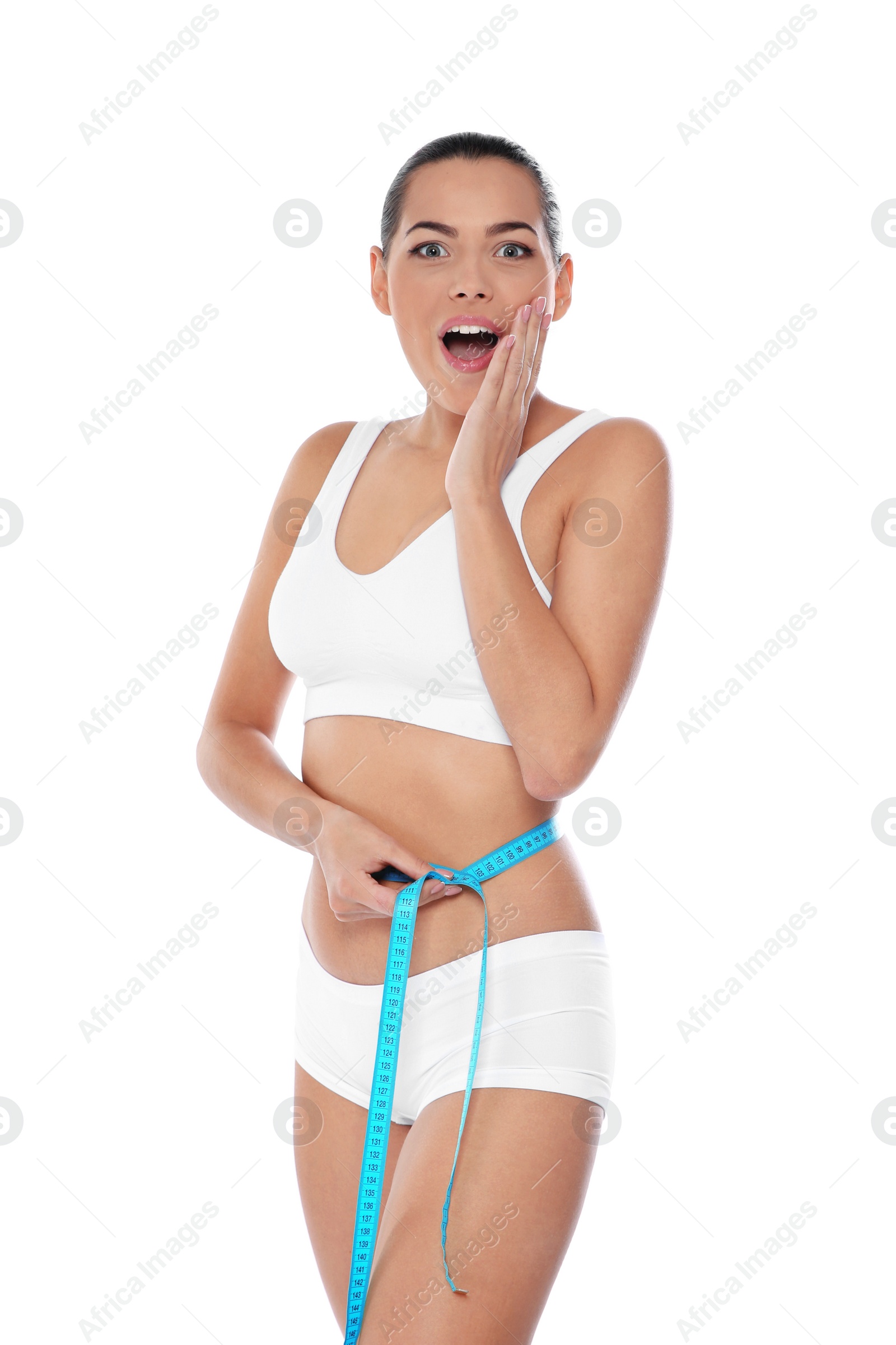 Photo of Slim woman measuring her waist on white background. Weight loss