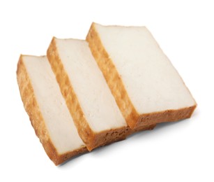 Photo of Slices of delicious smoked tofu isolated on white