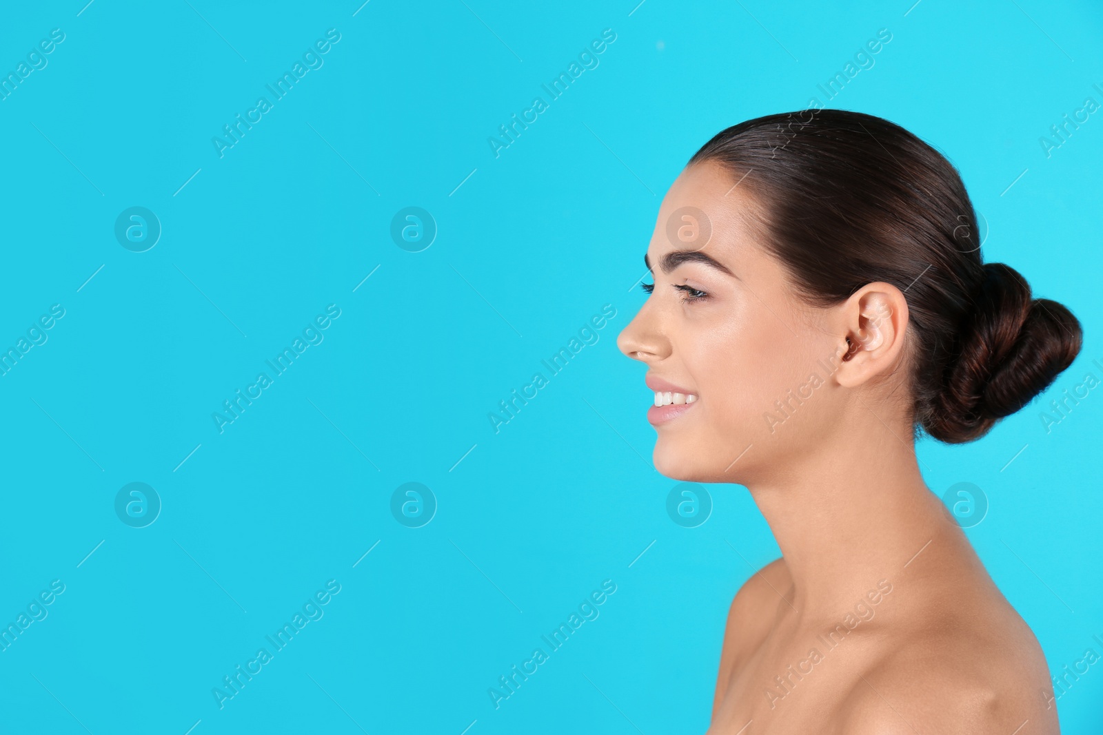 Photo of Portrait of beautiful young woman and space for text on color background. Cosmetic surgery concept