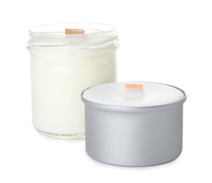 Photo of Beautiful candles with wooden wicks on white background