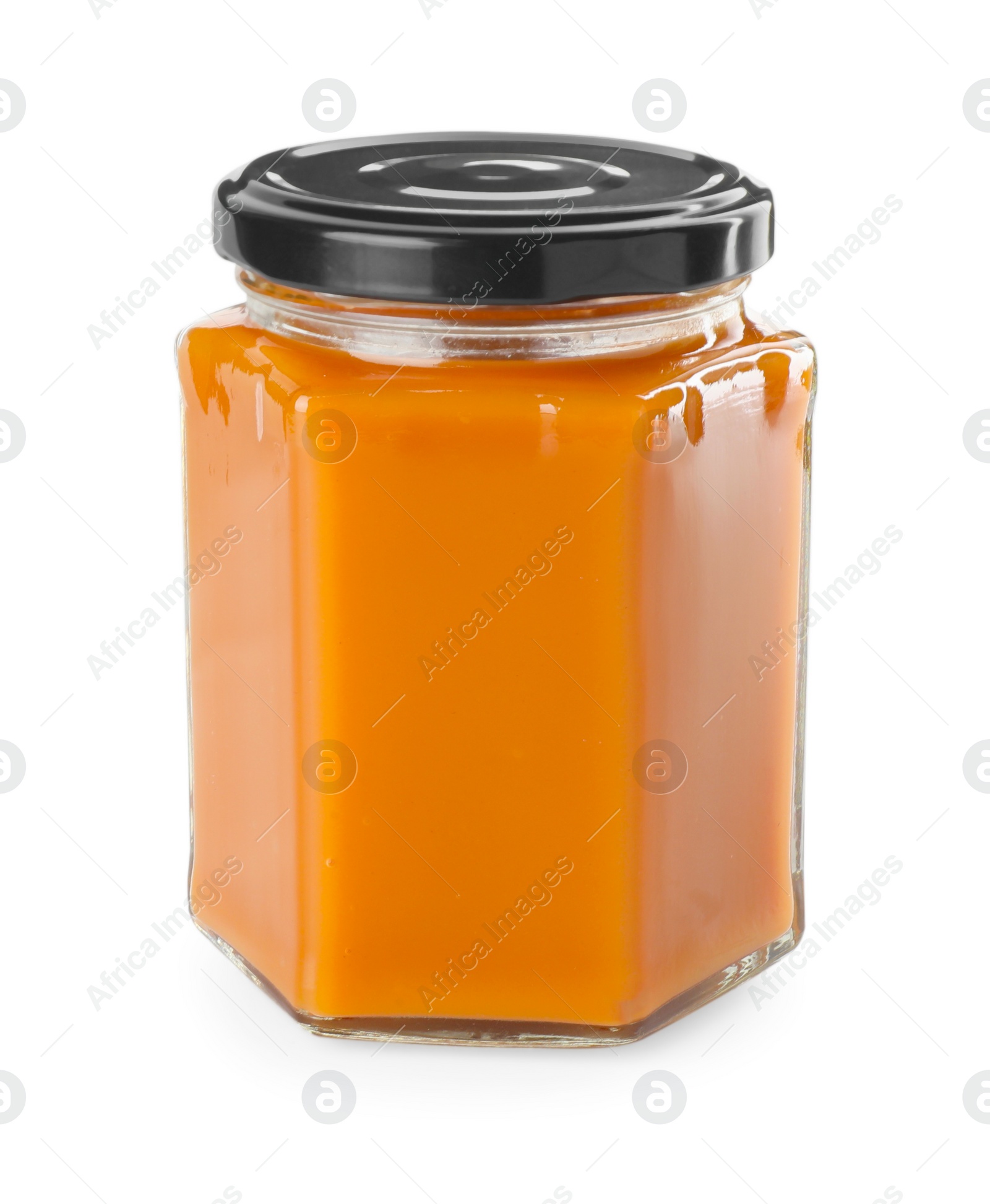 Photo of Delicious persimmon jam in jar isolated on white