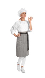 Photo of Female chef in apron showing perfect sign on white background