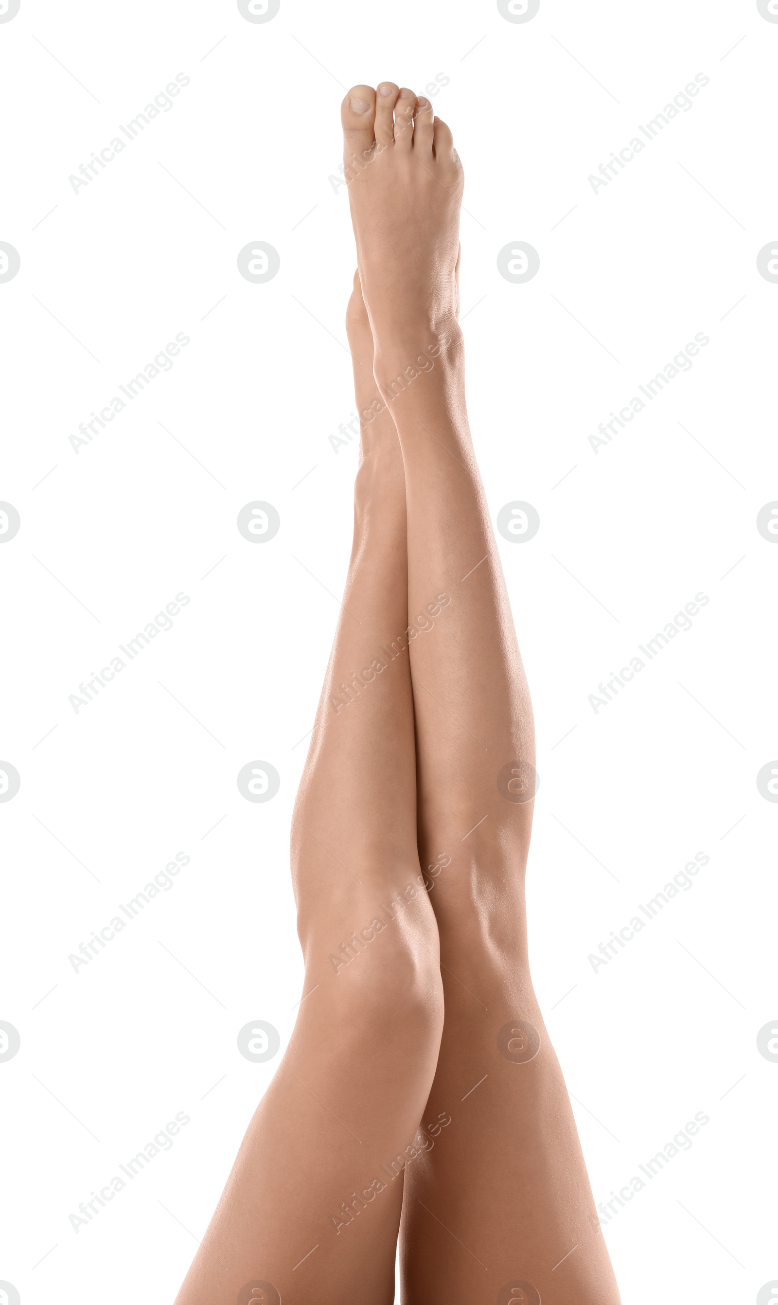 Photo of Young woman with beautiful long legs on white background, closeup