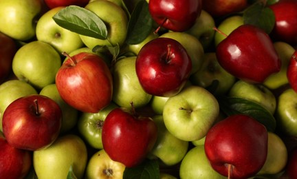 Fresh ripe red and green apples as background, top view