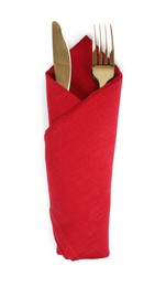 Golden fork and knife wrapped in red napkin on white background, top view