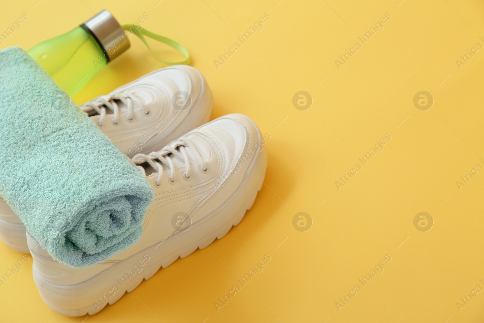 Photo of Composition with fitness equipment on color background. Space for text