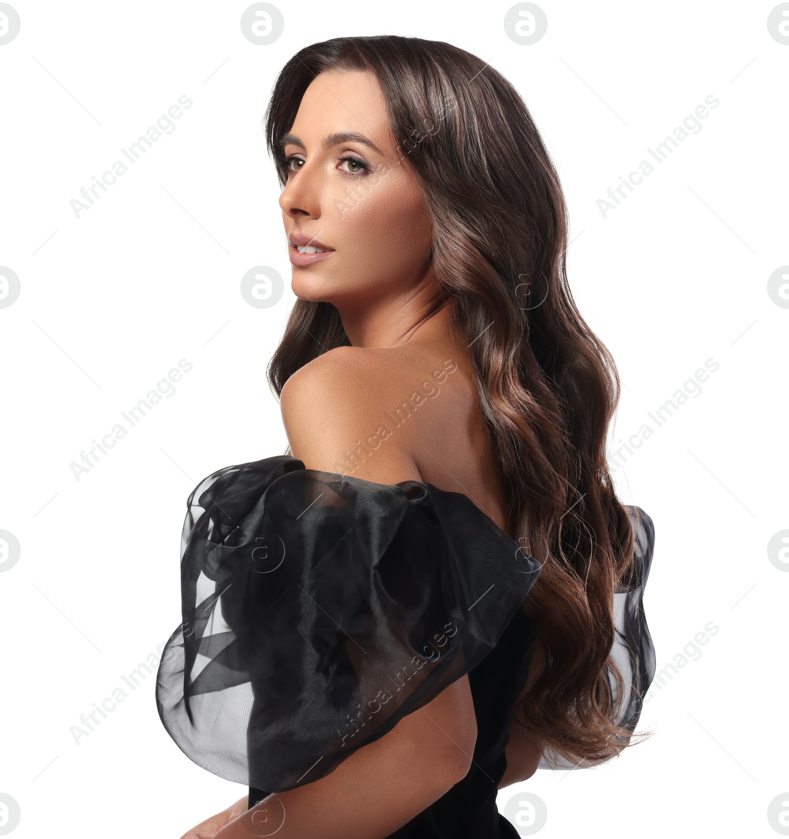 Image of Gorgeous woman with shiny wavy hair on white background. Professional hairstyling