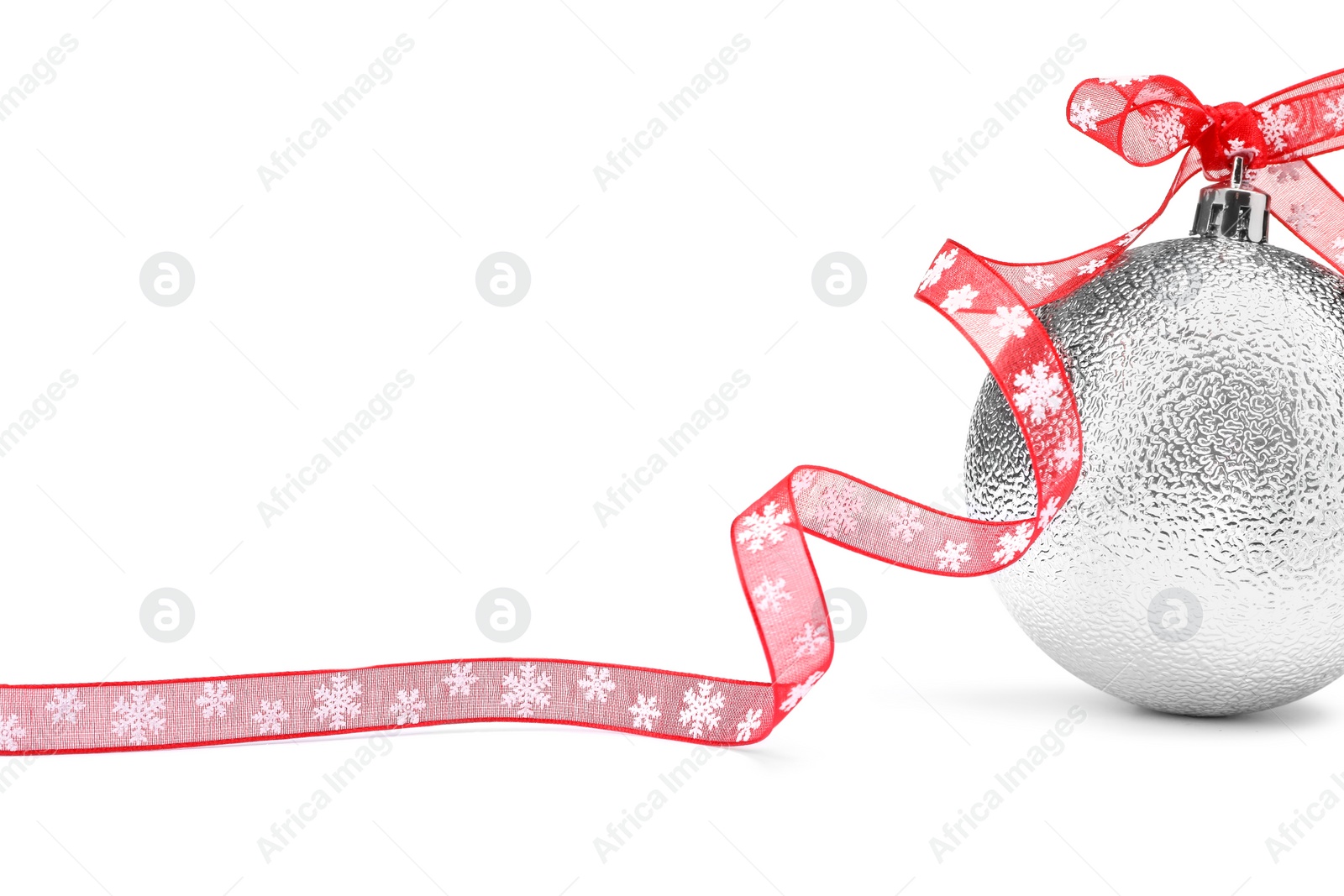 Photo of Beautiful Christmas ball with red ribbon isolated on white