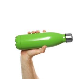 Man holding green thermos bottle on white background, closeup