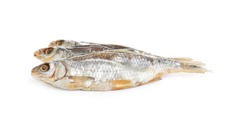 Photo of Tasty dried fish isolated on white. Seafood