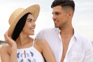 Lovely couple spending time together outdoors in summer