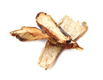 Photo of Slices of dried mushrooms on white background