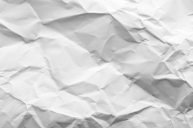 Photo of Sheet of crumpled paper as background. Space for design