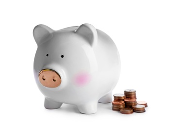Cute piggy bank and coins on white background. Money saving concept