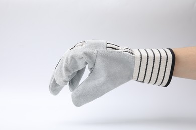 Woman in gardening glove on white background, closeup