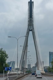 Beautiful view of city bridge with cars on sunny day