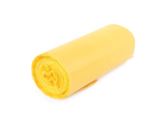 Photo of Roll of yellow garbage bags isolated on white