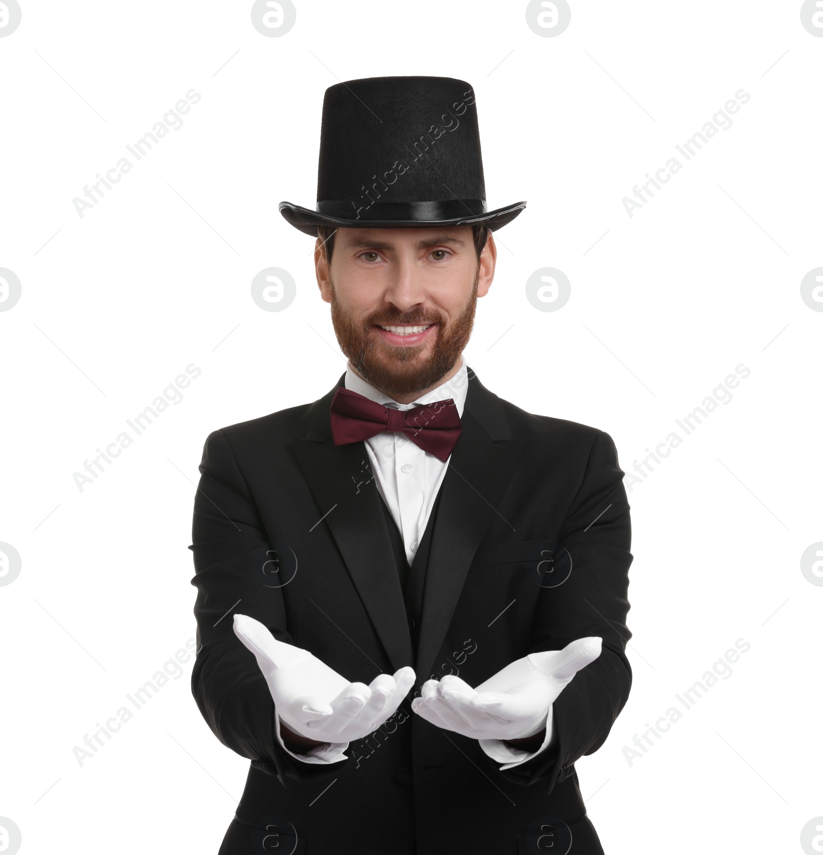 Photo of Happy magician in top hat on white background