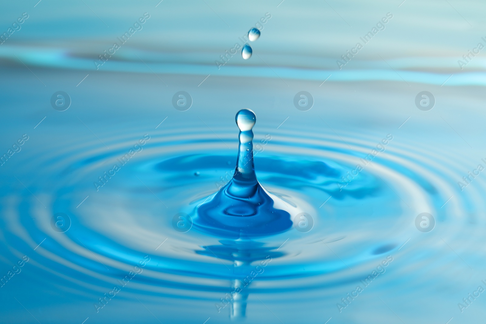 Photo of Splash of clear water with drops as background, closeup