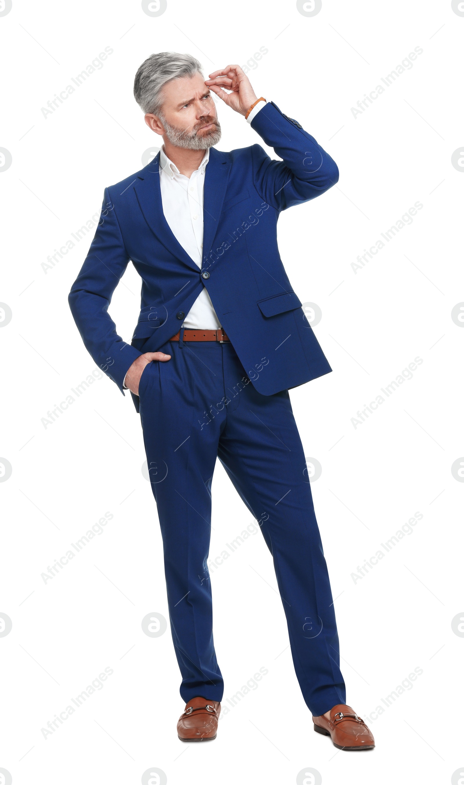 Photo of Mature businessman in stylish clothes posing on white background