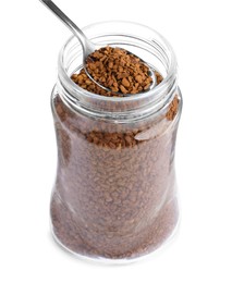 Spoon and glass jar with instant coffee on white background