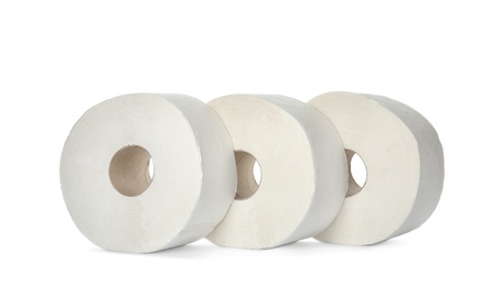 Photo of Rolls of toilet paper on white background