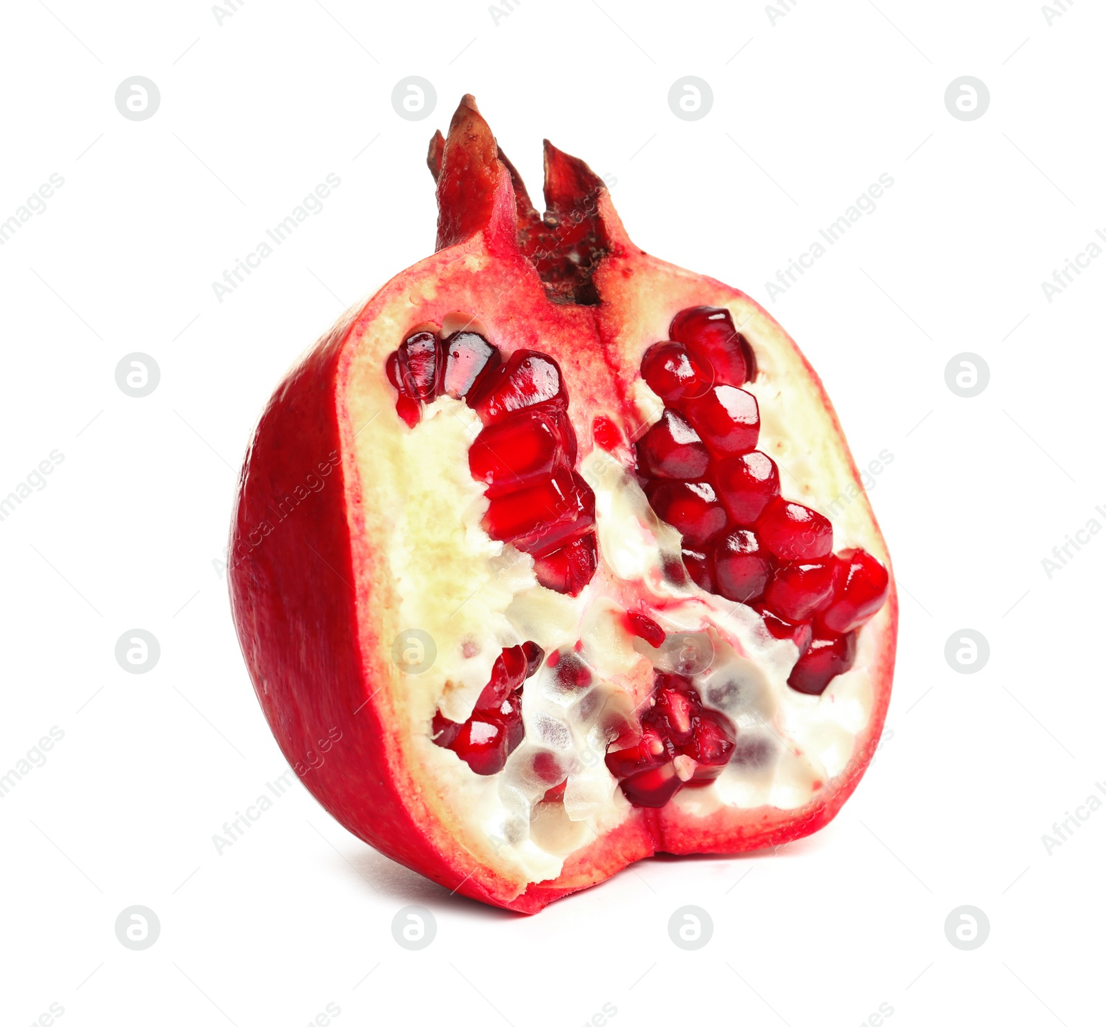 Photo of Ripe fresh pomegranate half with juicy seeds on white background