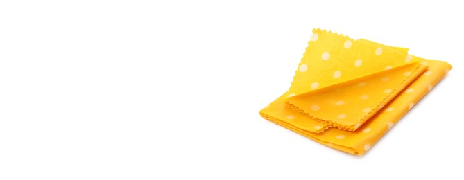 Image of Yellow beeswax food wraps on white background, banner design