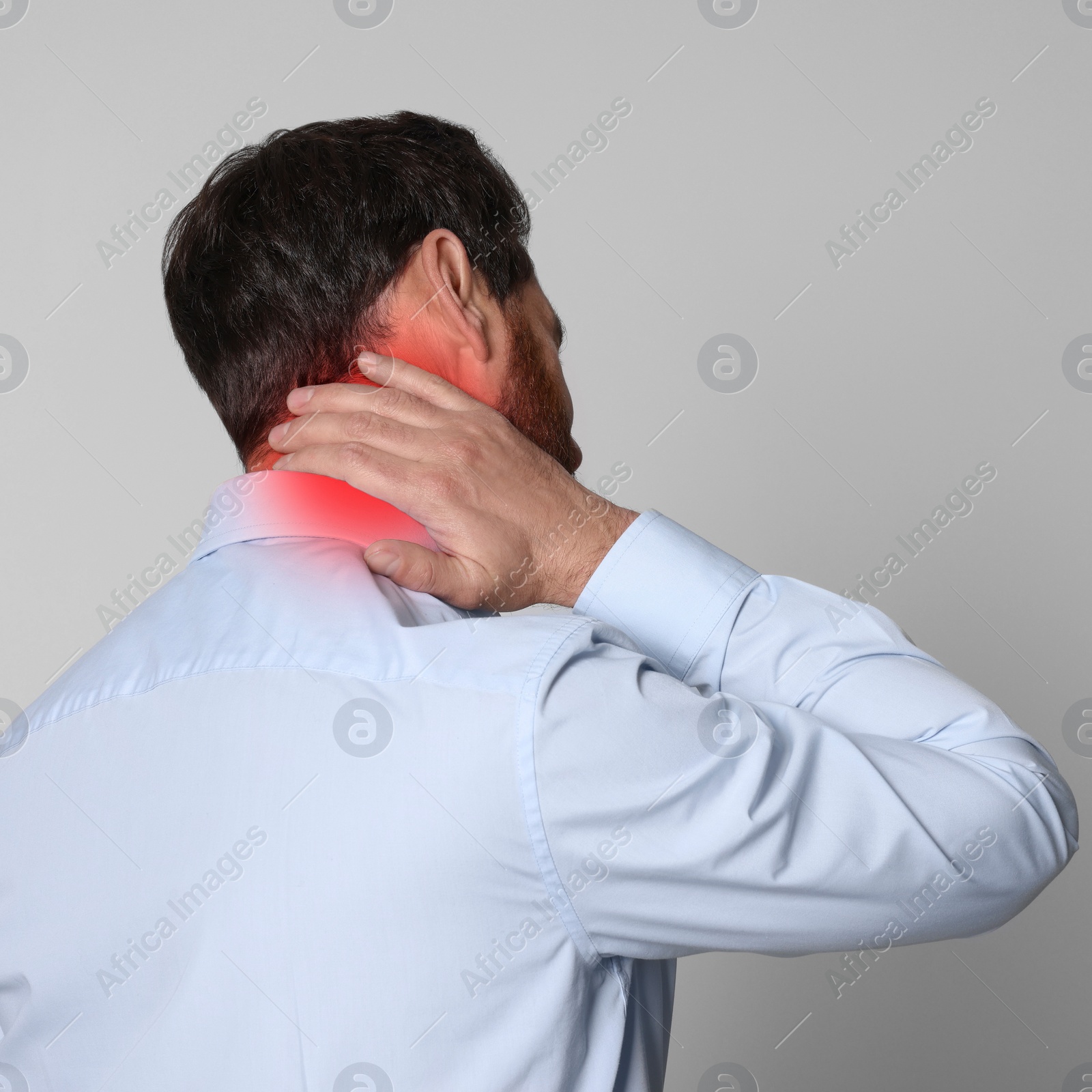 Image of Man suffering from rheumatism on light background