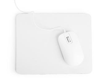 Photo of Modern wired mouse and pad isolated on white, top view
