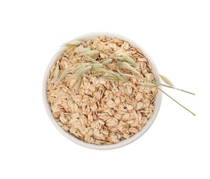 Photo of Bowl of oatmeal and branches with florets isolated on white, top view